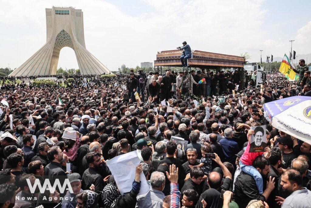 Mourners attend the funeral for victims of the helicopter crash that killed Iran's President Ebrahim Raisi, Foreign Minister Hossein Amirabdollahian and others