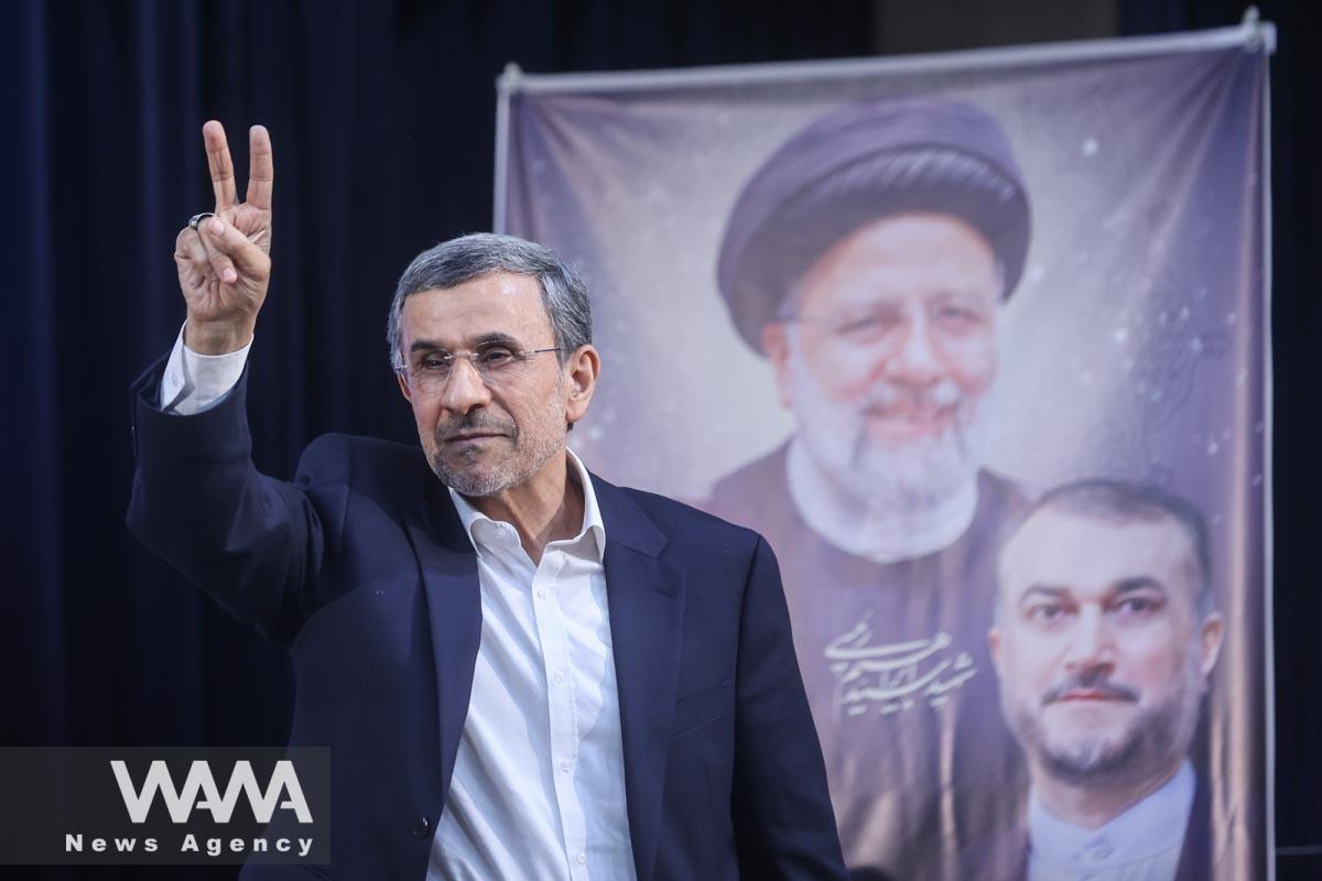 Mahmoud Ahmadinejad former president of Iran, waves at a press conference after registering as a candidate for the presidential election at the Interior Ministry