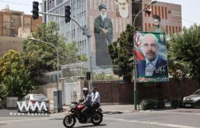 A banner of presidential candidate Mohammad Bagher Ghalibaf ​is displayed on a street in Tehran