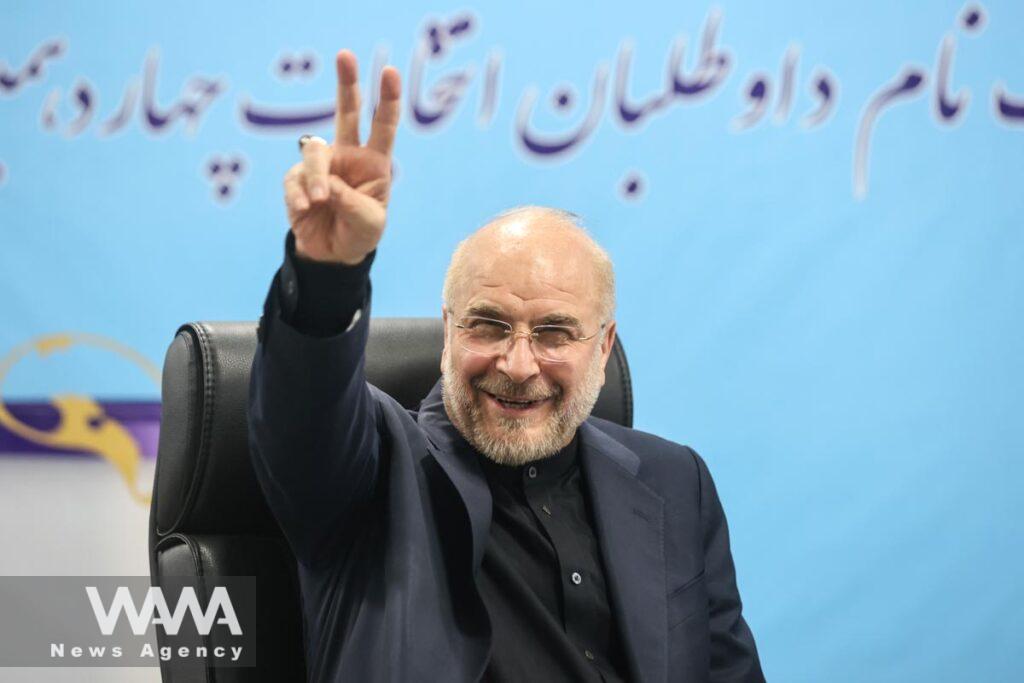 Speaker of the Parliament of Iran Mohammad Bagher Ghalibaf shows his identification document, as he registers as a candidate for the presidential election at the Interior Ministry