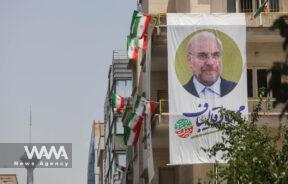 A banner of presidential candidate Mohammad Bagher Ghalibaf ​is displayed on a street