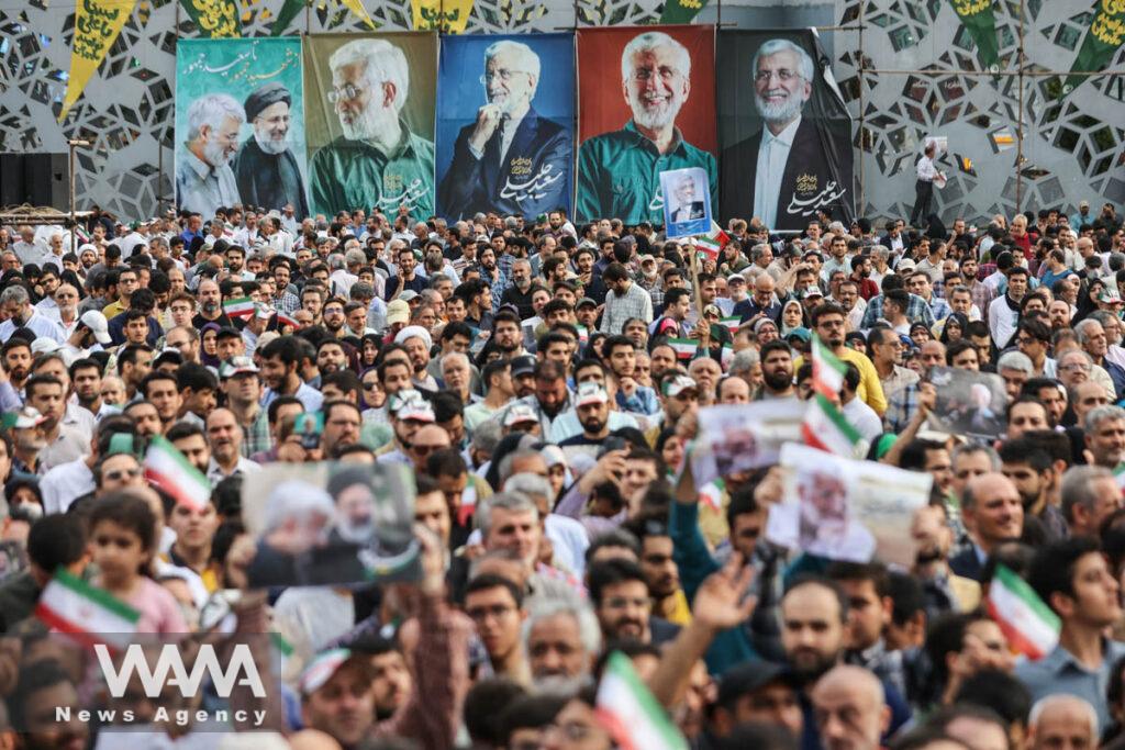 Banners of presidential candidate Saeed Jalili ​are displayed during a campaign event