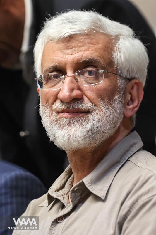 Iranian presidential candidate Saeed Jalili looks on during a campaign event in Tehran