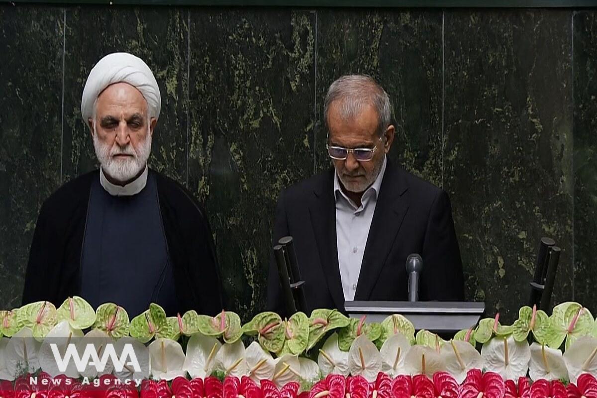 Masoud Pezeshkian, Taking an oath at his inauguration ceremony. 30 July 2024. Islamic Consultative Assembly / WANA News Agency