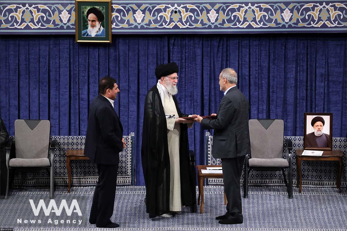 The endorsement ceremony of Iran's new president, Masoud Pezeshkian, by Ayatollah Khamenei - 28 July, 2024 -Tehran. Leader office / WANA News Agency