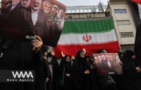 Iranians attend the funeral procession of assassinated Hamas chief, Ismail Haniyeh in Tehran