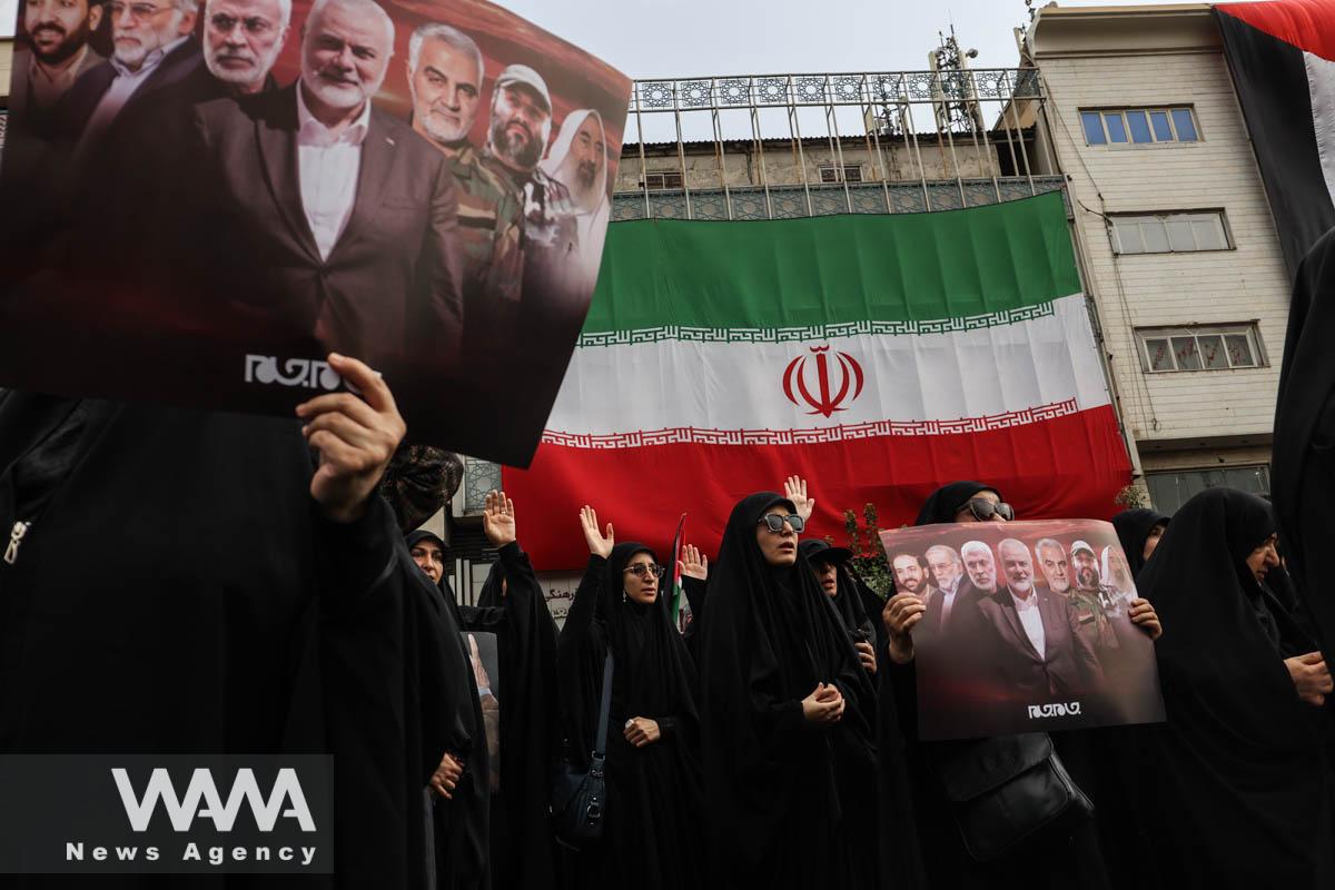 Iranians attend the funeral procession of assassinated Hamas chief, Ismail Haniyeh in Tehran