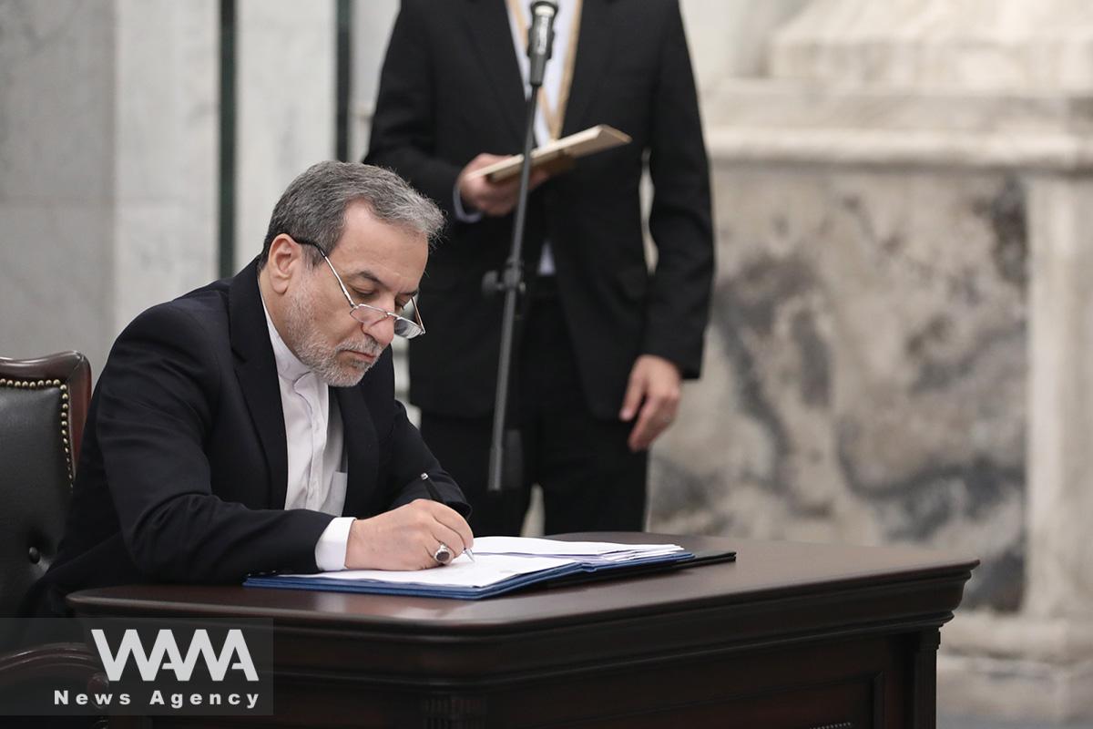 Seyed Abbas Araqchi signing of a Memorandum of Understanding during President Pezashkian's trip to Iraq - 11 Sep 2024 - President office / WANA News Agency