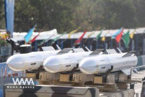 Iranian missiles are seen during the annual military parade