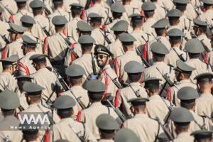 Iranian armed forces members march during the annual military parade