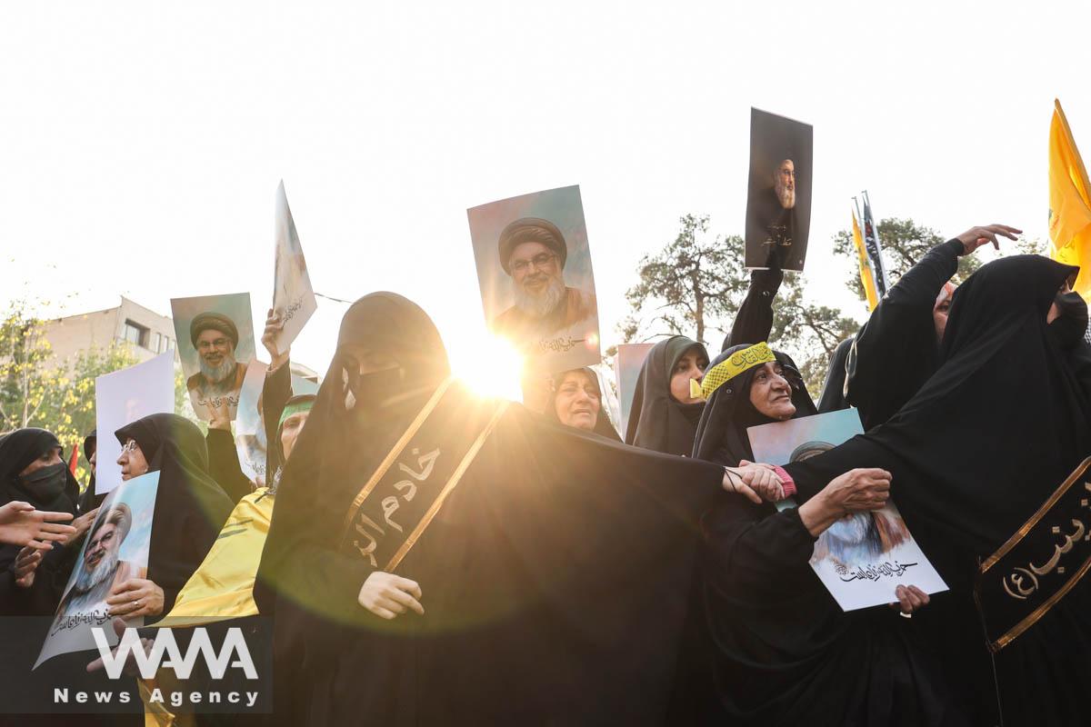 People gather to mourn following the death of Lebanon's Hezbollah leader Sayyed Hassan Nasrallah