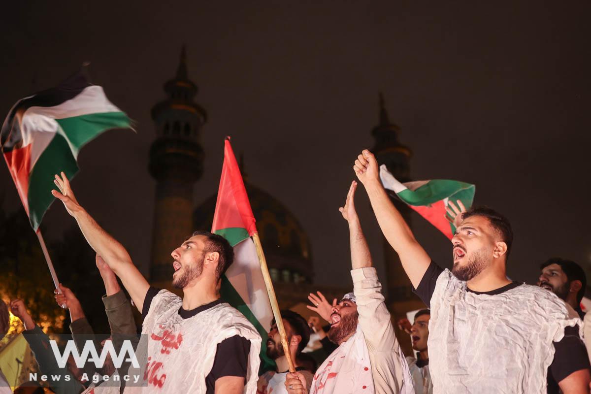 Demonstrators chant during an anti-Israel protest following an Israeli strike on Lebanon