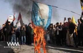 Iranians burn the U.S. flag during a gathering to support IRGC attack on Israel,