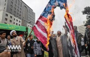 Iranians burn a U.S. flag during the 45th anniversary of the U.S. expulsion from Iran