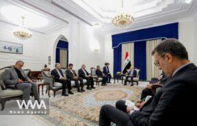 Iraqi President Abdul Latif Rashid meeting Iranian Foreign Minister Seyyed Abbas Araqchi in Baghdad