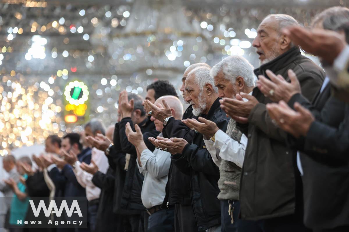 Iranians pray during the Muslim holy month of Ramadan at a mosque in Tehran