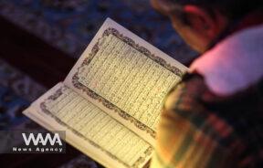 A man recites the Koran during the Muslim holy month of Ramadan at a mosque in Tehran